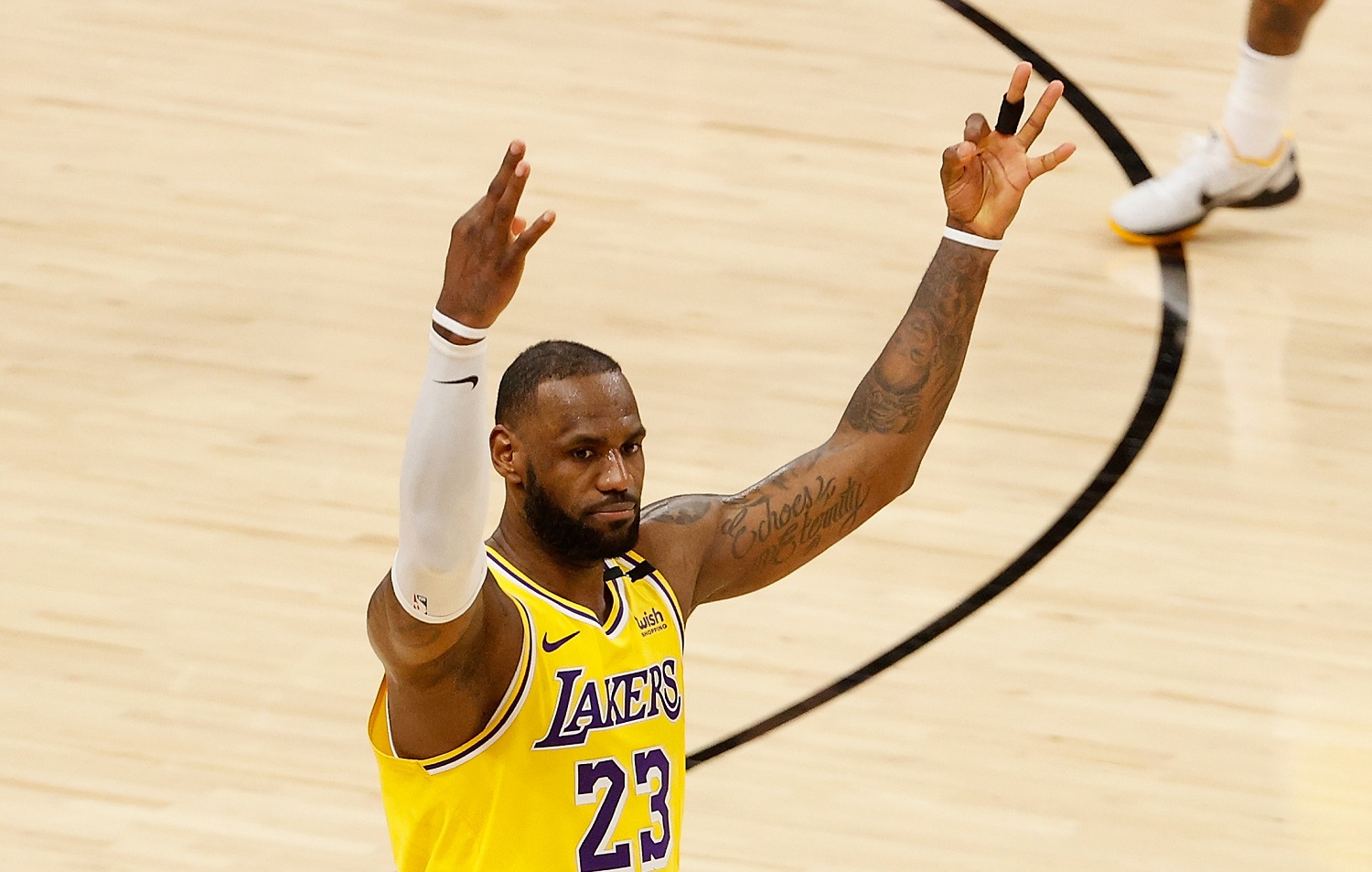 LeBron James of the Los Angeles Lakers reacts to a 3-point shot against the Phoenix Suns during Game 2 of the NBA Western Conference quarterfinals on May 25, 2021. | Christian Petersen/Getty Images