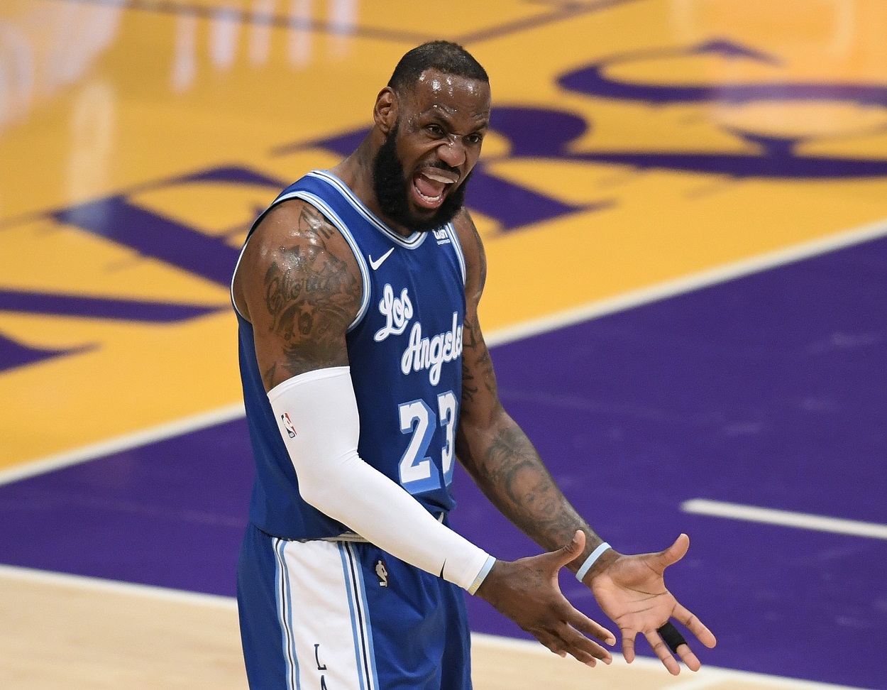 LeBron James argues a foul call during a Lakers-Timberwolves matchup in March 2021