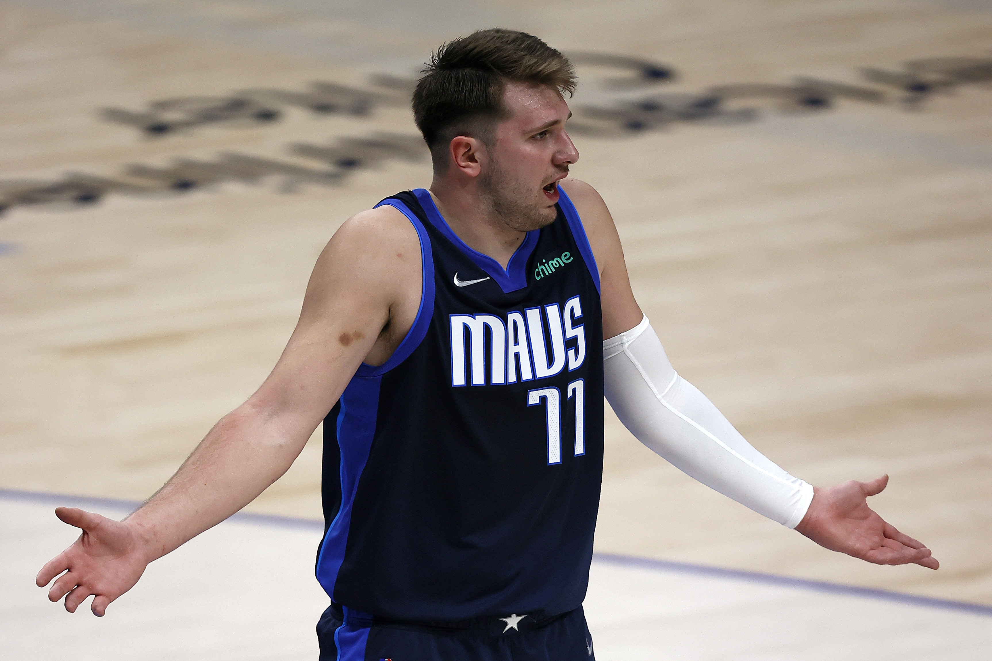 Luka Doncic of the Dallas Mavericks reacts after being called for a foul against the Detroit Pistons in the third quarter at American Airlines Center on April 21, 2021.