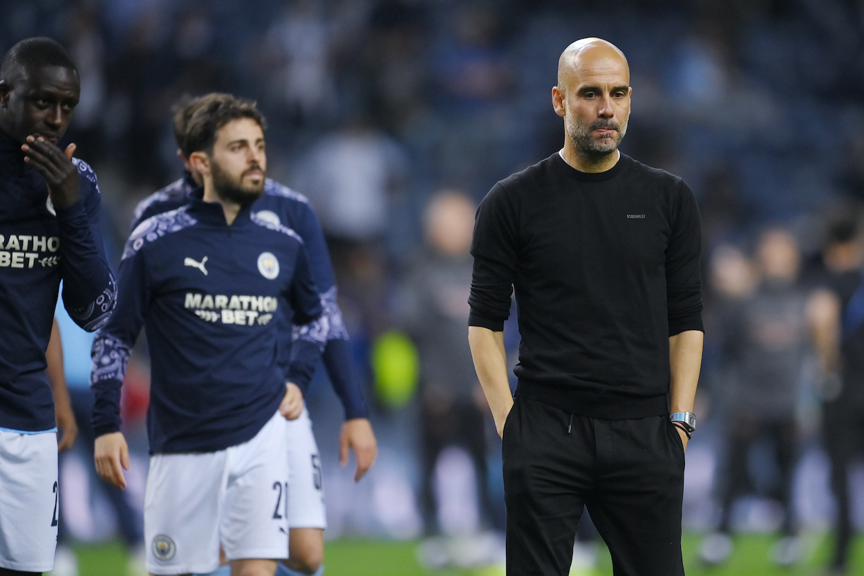 Pep Guardiola, Manager of Manchester City looks dejected following the UEFA Champions League Final between Manchester City and Chelsea FC at Estadio do Dragao on May 29, 2021 in Porto, Portugal.