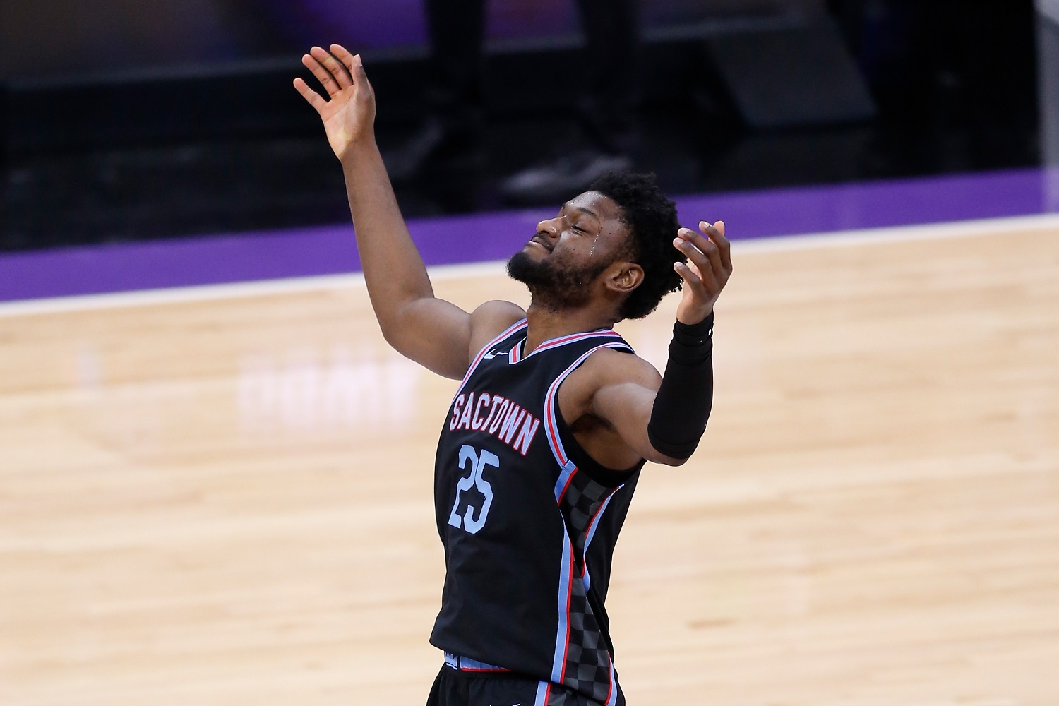 Chimezie Metu of the Sacramento Kings reacts to a play against the Oklahoma City Thunder during a game May 11, 2021 in Sacramento, California.