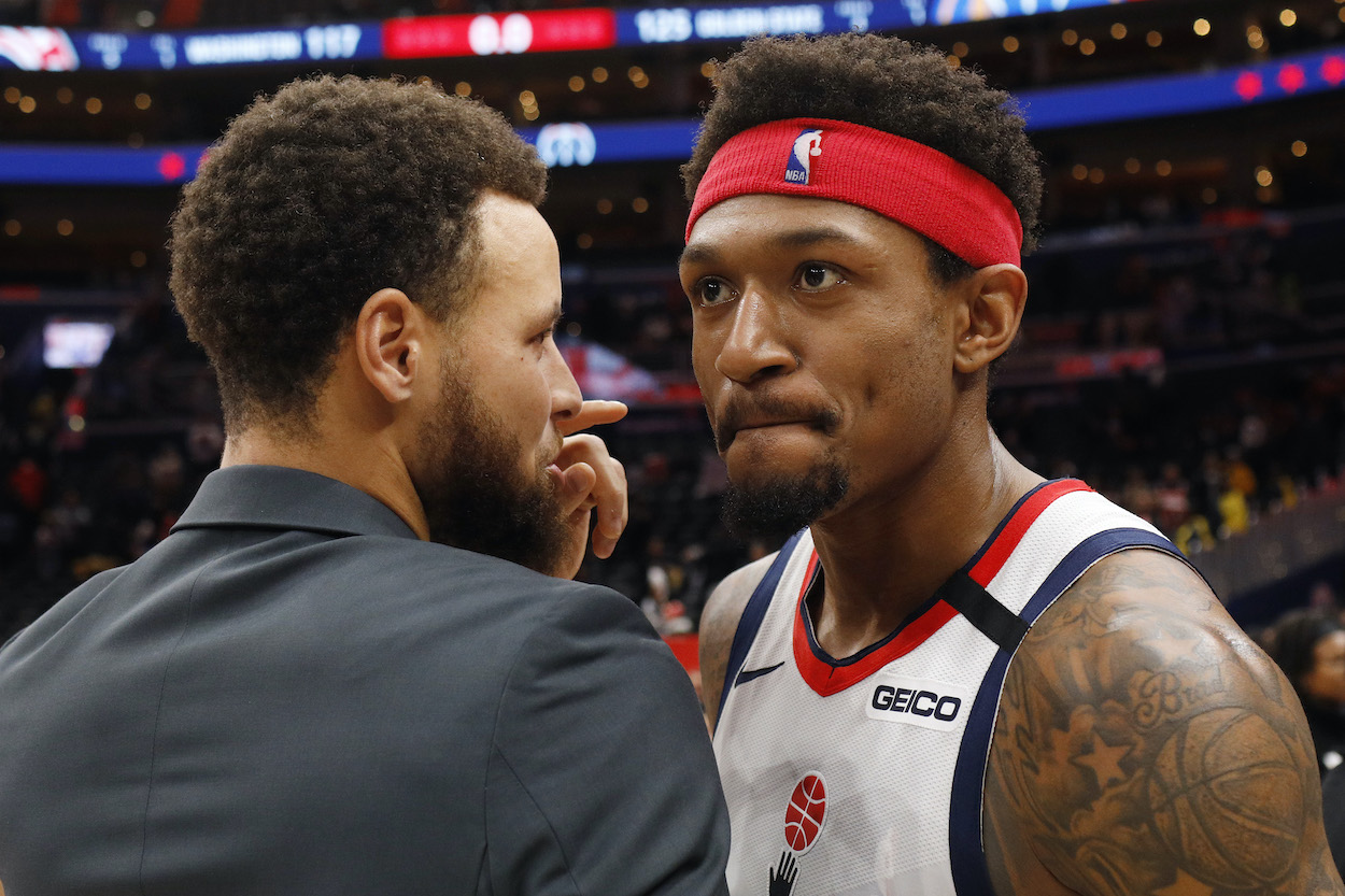 Bradley Beal of the Washington Wizards and Stephen Curry of the Golden State Warriors talk after the Golden State Warriors defeated the Wizards 125-117 at Capital One Arena on February 03, 2020 in Washington, DC.