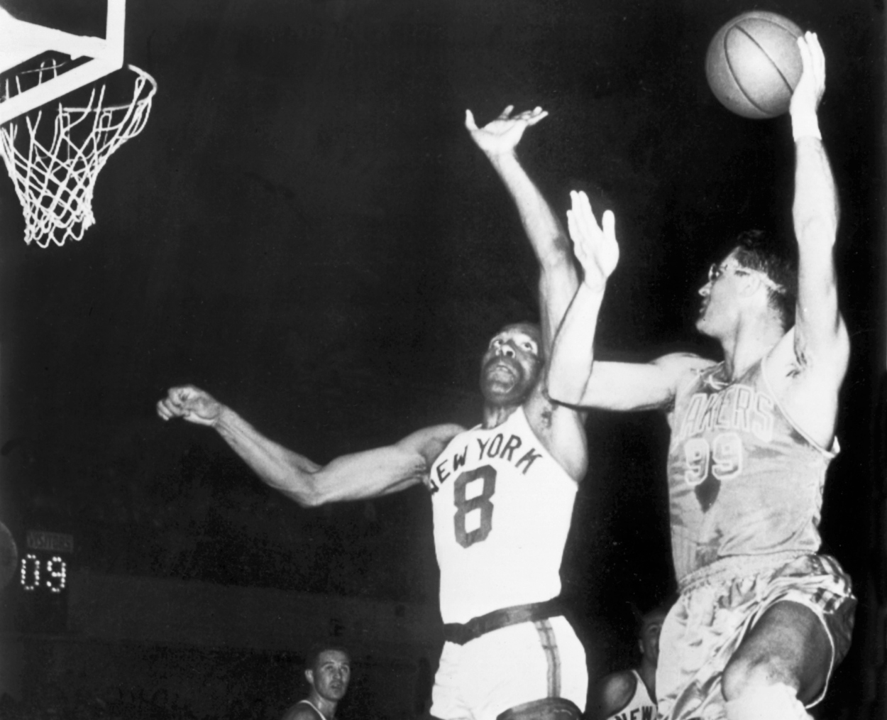 George Mikan (R) and the Minneapolis Lakers dominated the early NBA Playoffs