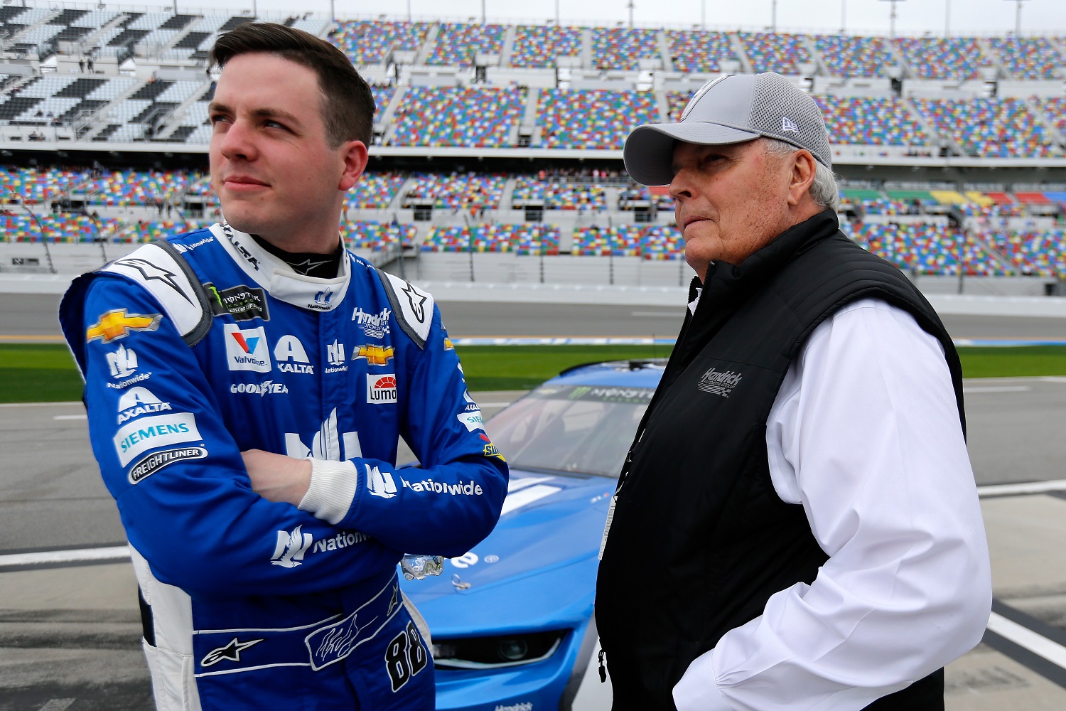 Alex Bowman, driver of the No. 48 Ally Chevy, talks with team owner Rick Hendrick.