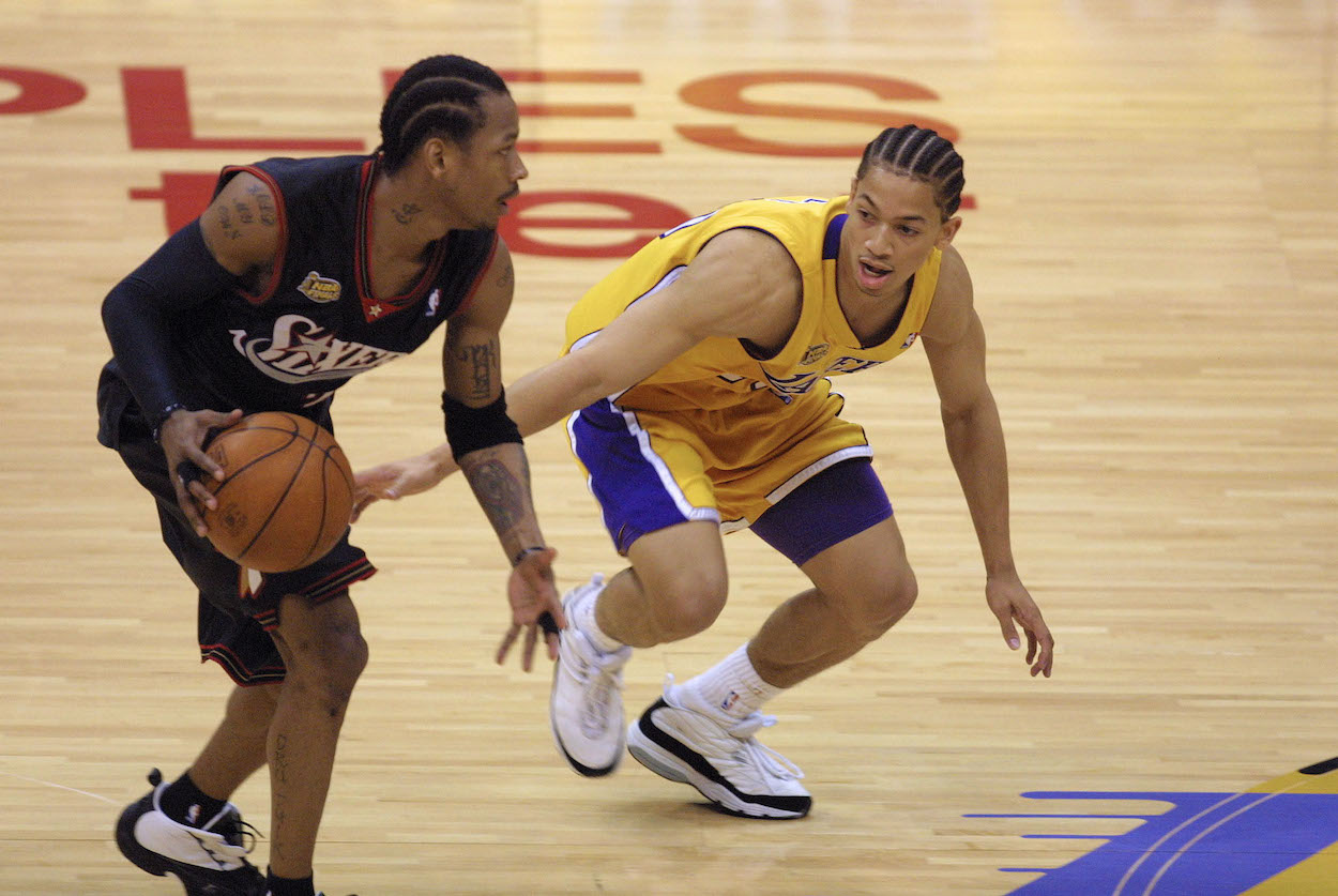 Allen Iverson is defended by Tyronn Lue