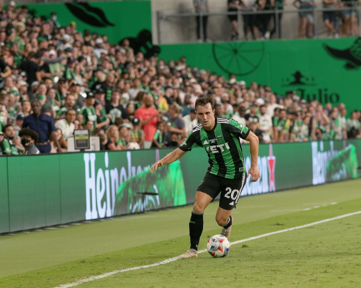Jared Stroud of Austin FC dribbles ball in game at Q2 Stadium
