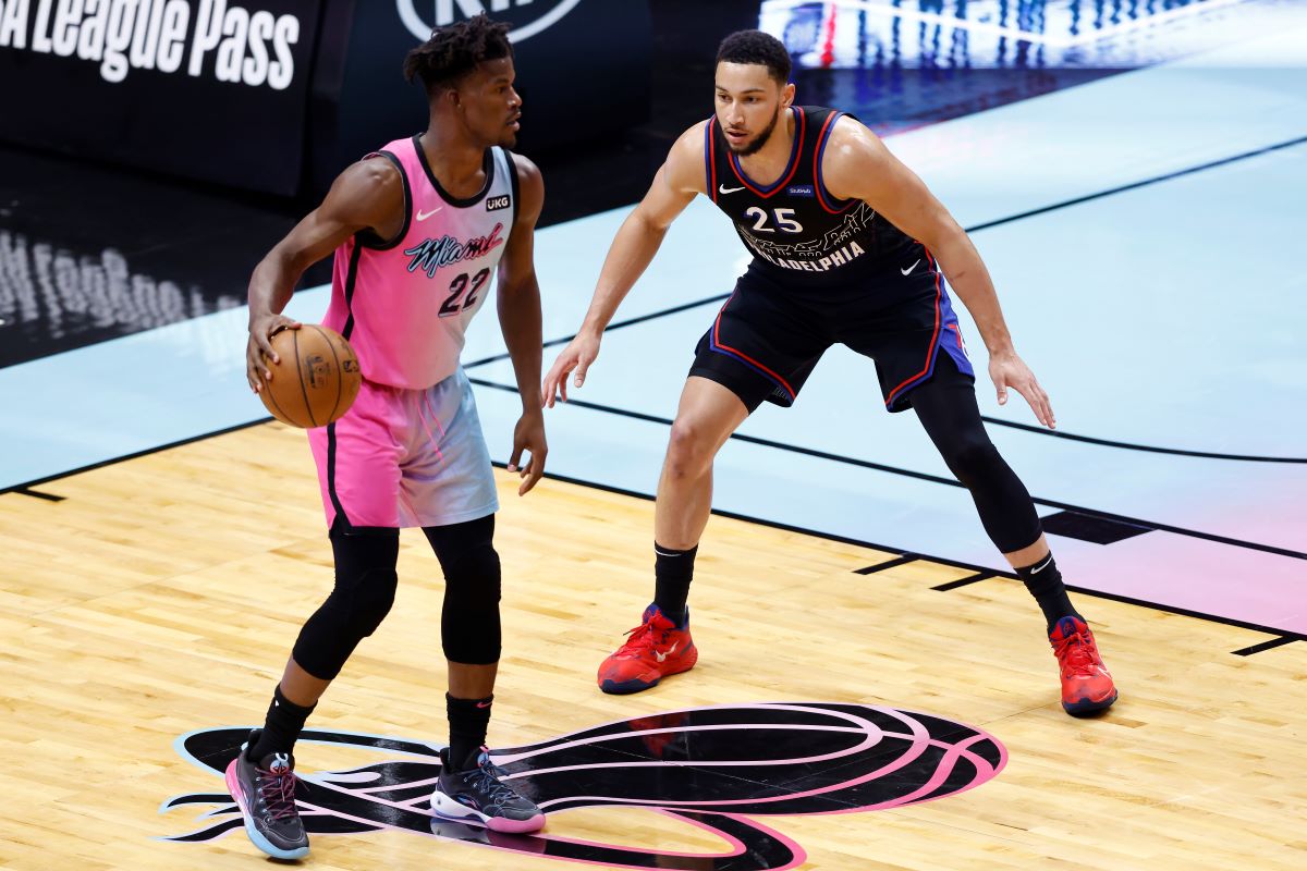 Ben Simmons guards Jimmy Butler.