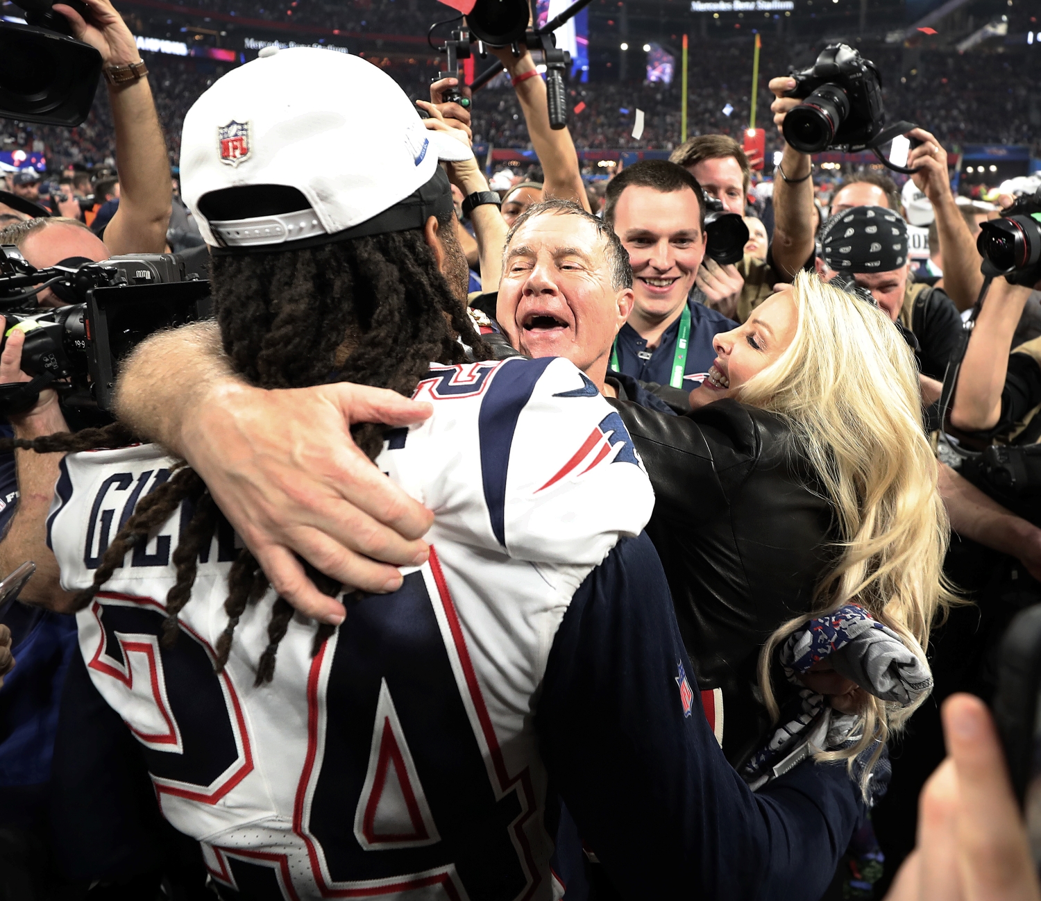 Patriots head coach Bill Belichick embraces cornerback Stephon Gilmore after Super Bowl 53.
