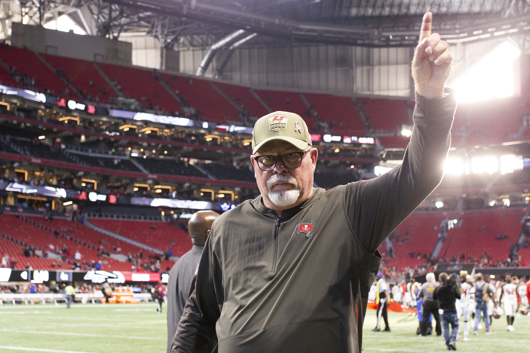 Bruce Arians walks off the field after a 2019 Tampa Bay Buccaneers game