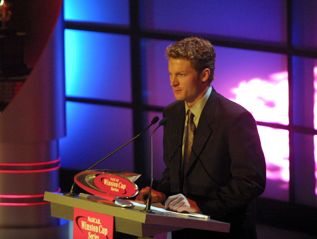 Dale Earnhardt Jr. stands at podium of banquet