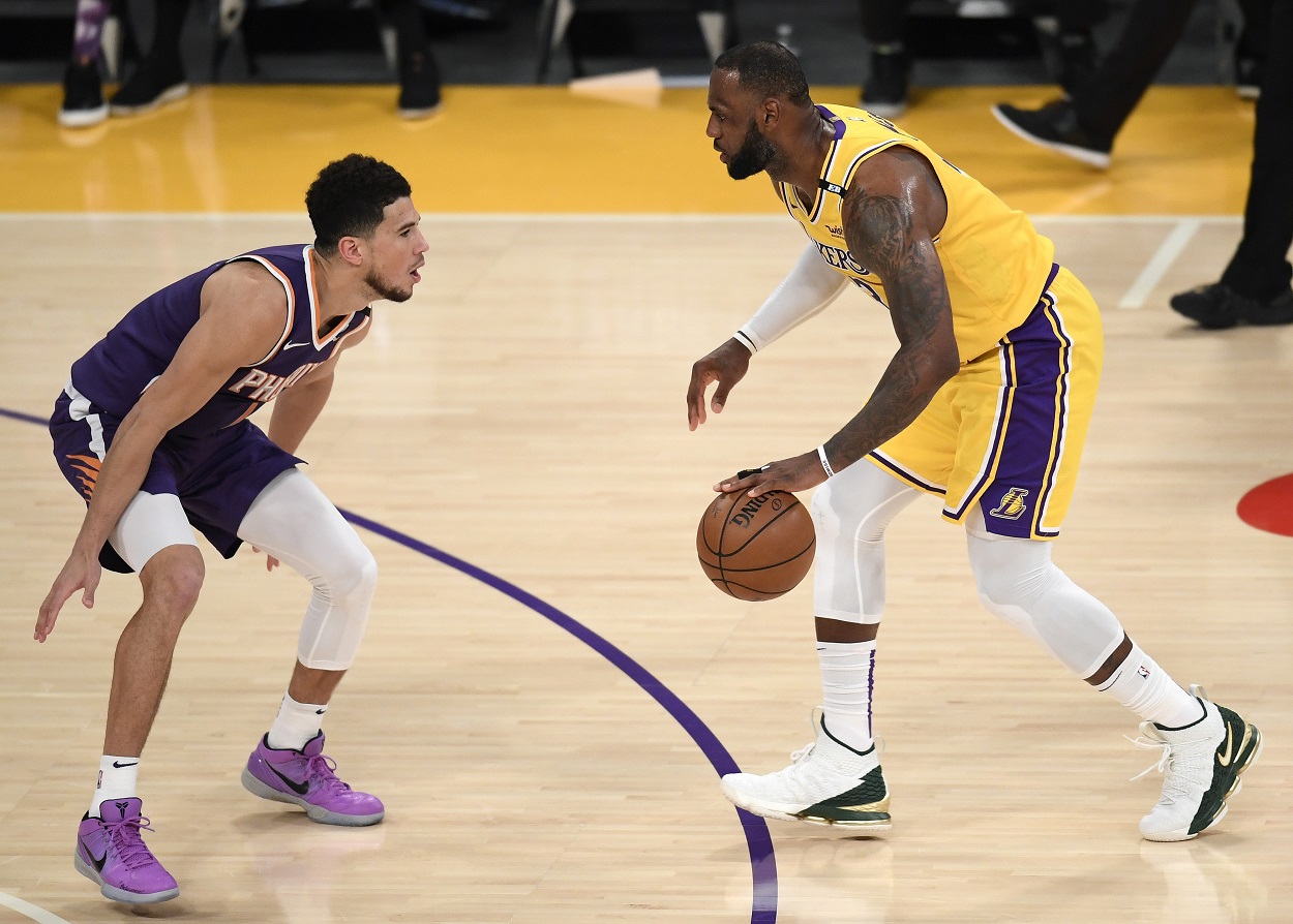 Devin Booker guards LeBron James during Game 6 of the Suns-Lakers series in the 2021 NBA playoffs