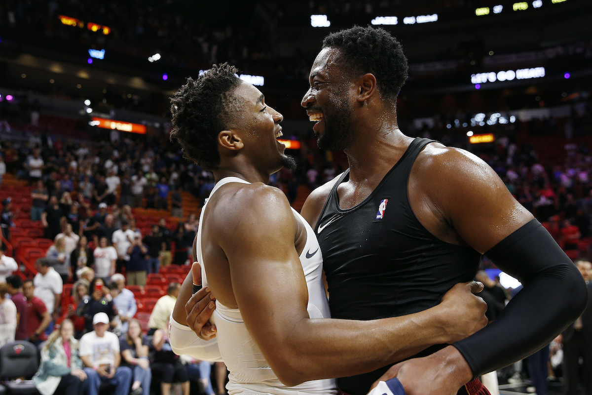 Donovan Mitchell of the Utah Jazz greets Dwyane Wade of the Miami Heat after a game in 2018