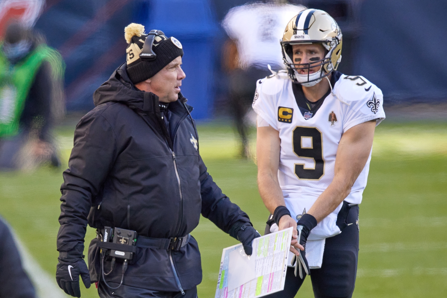 New Orleans Saints head coach Sean Payton speaks with quarterback Drew Brees during a game.