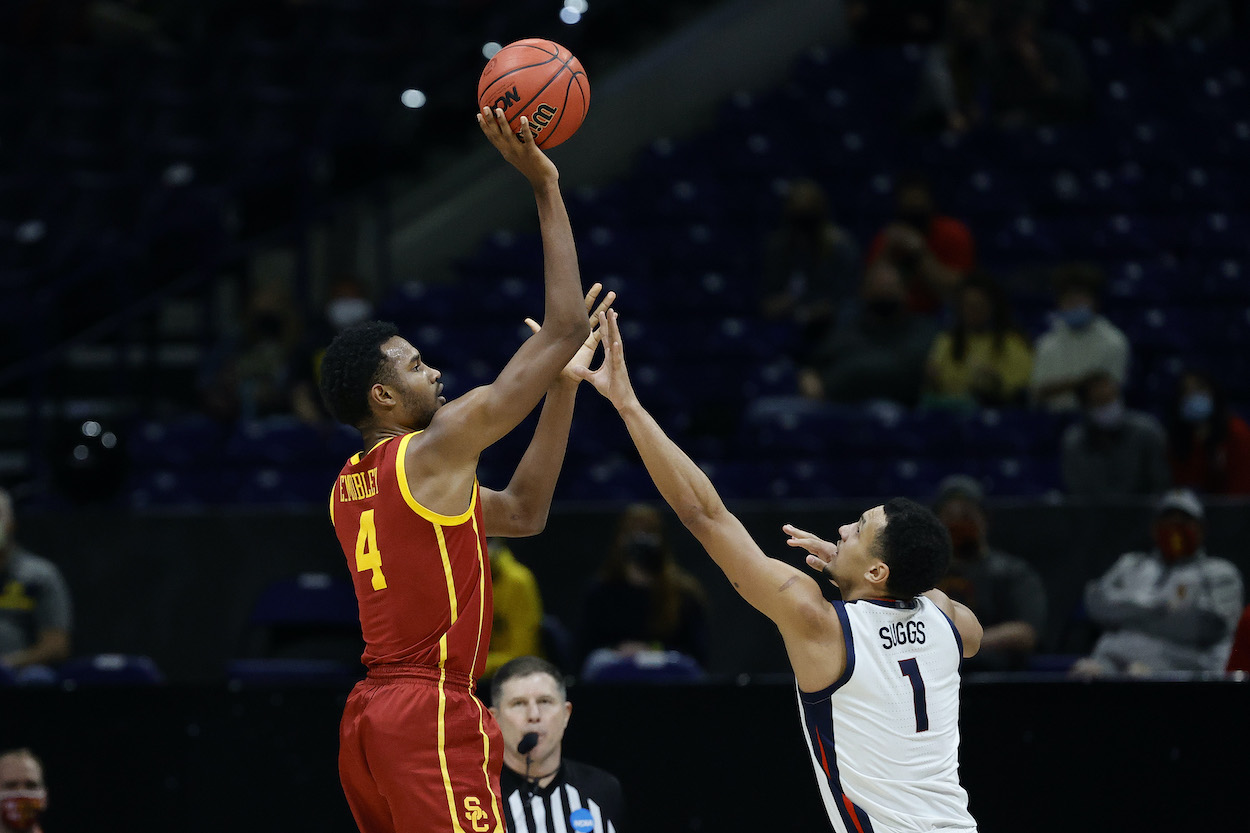 Two players that feature prominently in this post-lottery 2021 NBA mock draft, Evan Mobley of the USC Trojans shoots the ball against Jalen Suggs of the Gonzaga Bulldogs during the second half in the Elite Eight round game of the 2021 NCAA Men's Basketball Tournament.