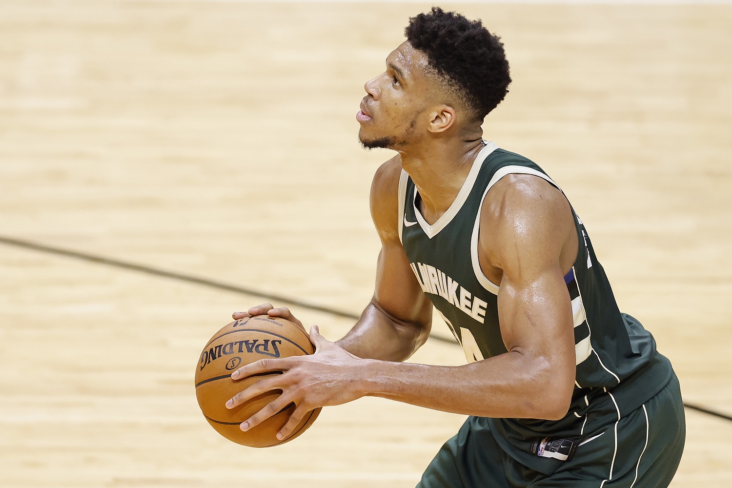 Giannis Antetokounmpo of the Milwaukee Bucks shoots a free throw against the Miami Heat during the fourth quarter on Dec. 30, 2020, in Miami.