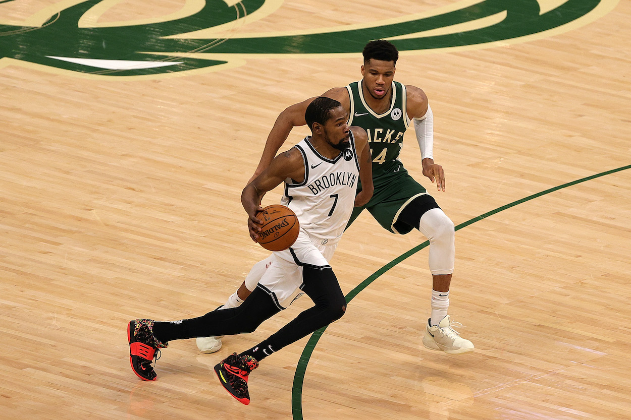 Kevin Durant of the Brooklyn Nets is defended by Giannis Antetokounmpo of the Milwaukee Bucks during the Eastern Conference second round