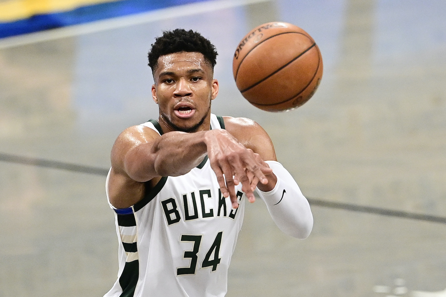 Giannis Antetokounmpo in action for the Milwaukee Bucks during a 2021 NBA playoff game against the Brooklyn Nets.