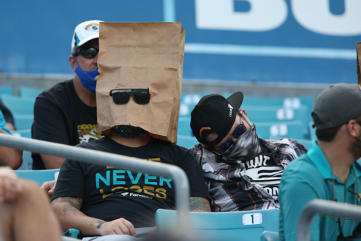 A Jacksonville Jaguars fan watches the game with a paper bag on during the game between the Detroit Lions and the Jacksonville Jaguars on October 18, 2020. These are two of the teams you can make NFL futures bets on to go 0-17 in 2021.