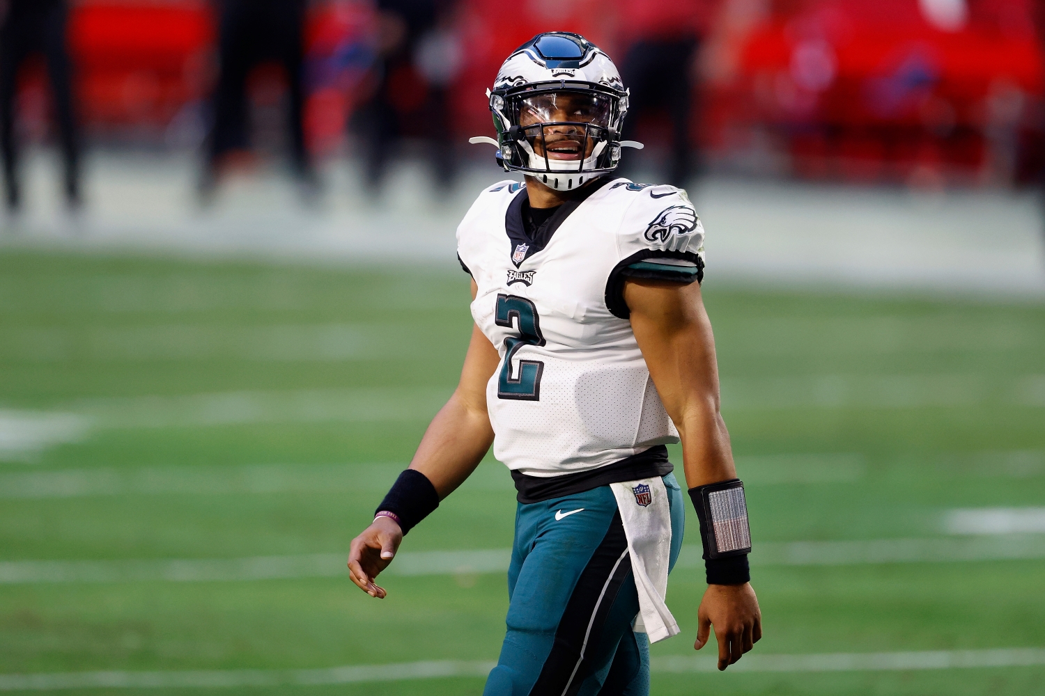 Philadelphia Eagles quarterback Jalen Hurts looks up as he walks off the field.