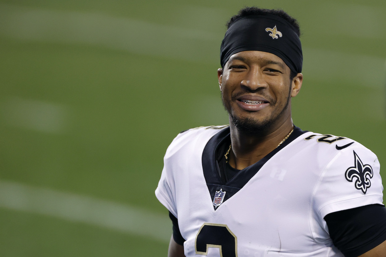 Quarterback Jameis Winston of the New Orleans Saints shares a smile following their game against the Carolina Panthers at Bank of America Stadium on January 03, 2021 in Charlotte, North Carolina.