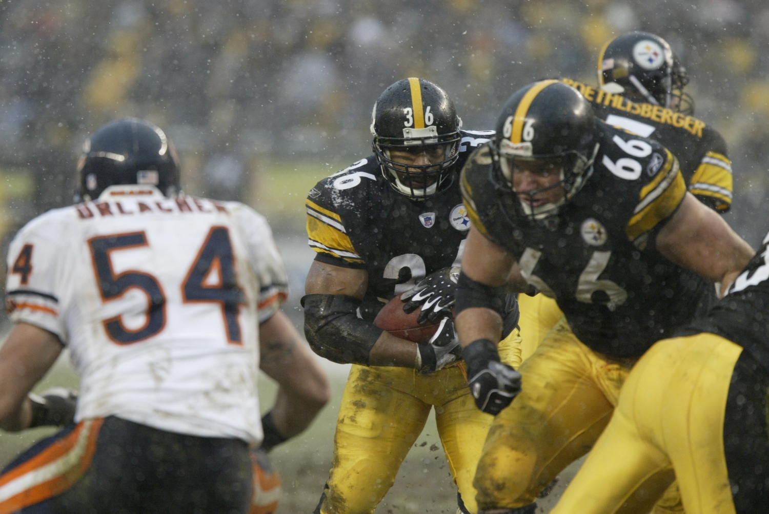 Jerome Bettis runs behind Pittsburgh Steelers guard Alan Faneca.