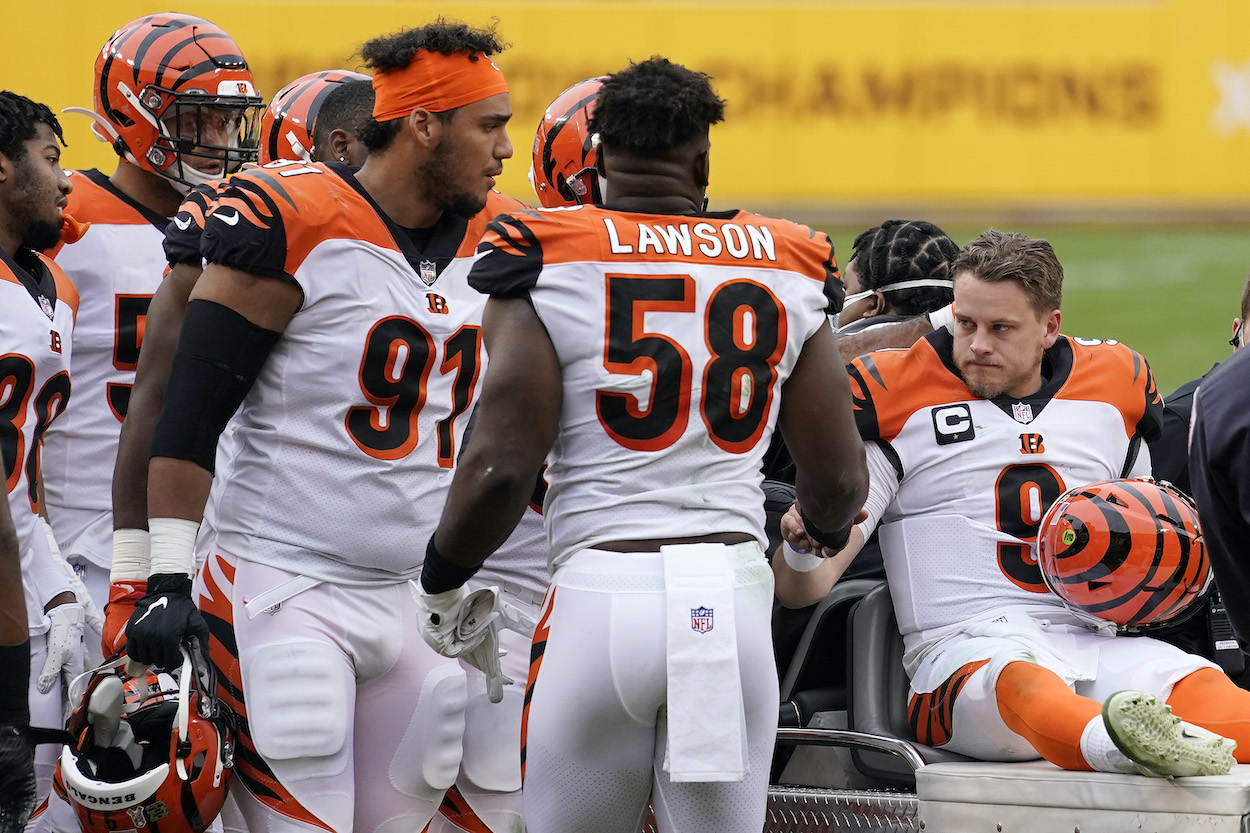 Joe Burrow of the Cincinnati Bengals is carted off the field after injuring his left knee against the Washington Football Team.