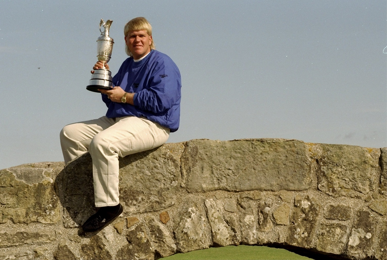 John Daly holds the Claret Jug after the 1995 British Open at St. Andrews Golf Club.