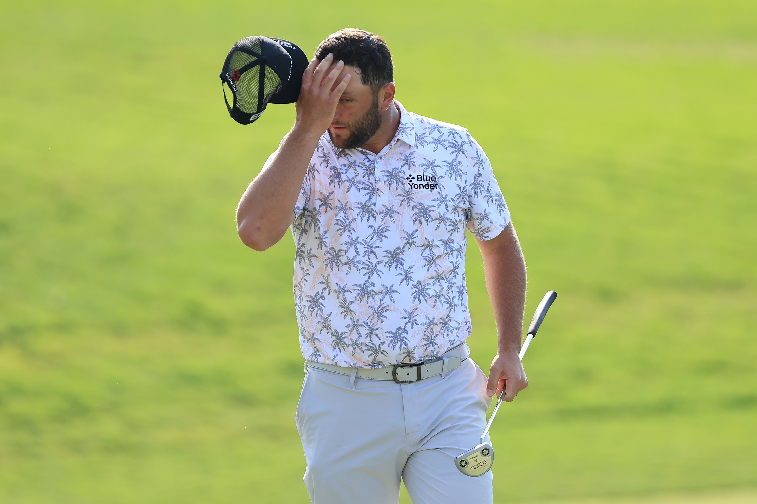 Jon Rahm reacts as he walks off the 18th green after his third round of the Memorial Tournament.