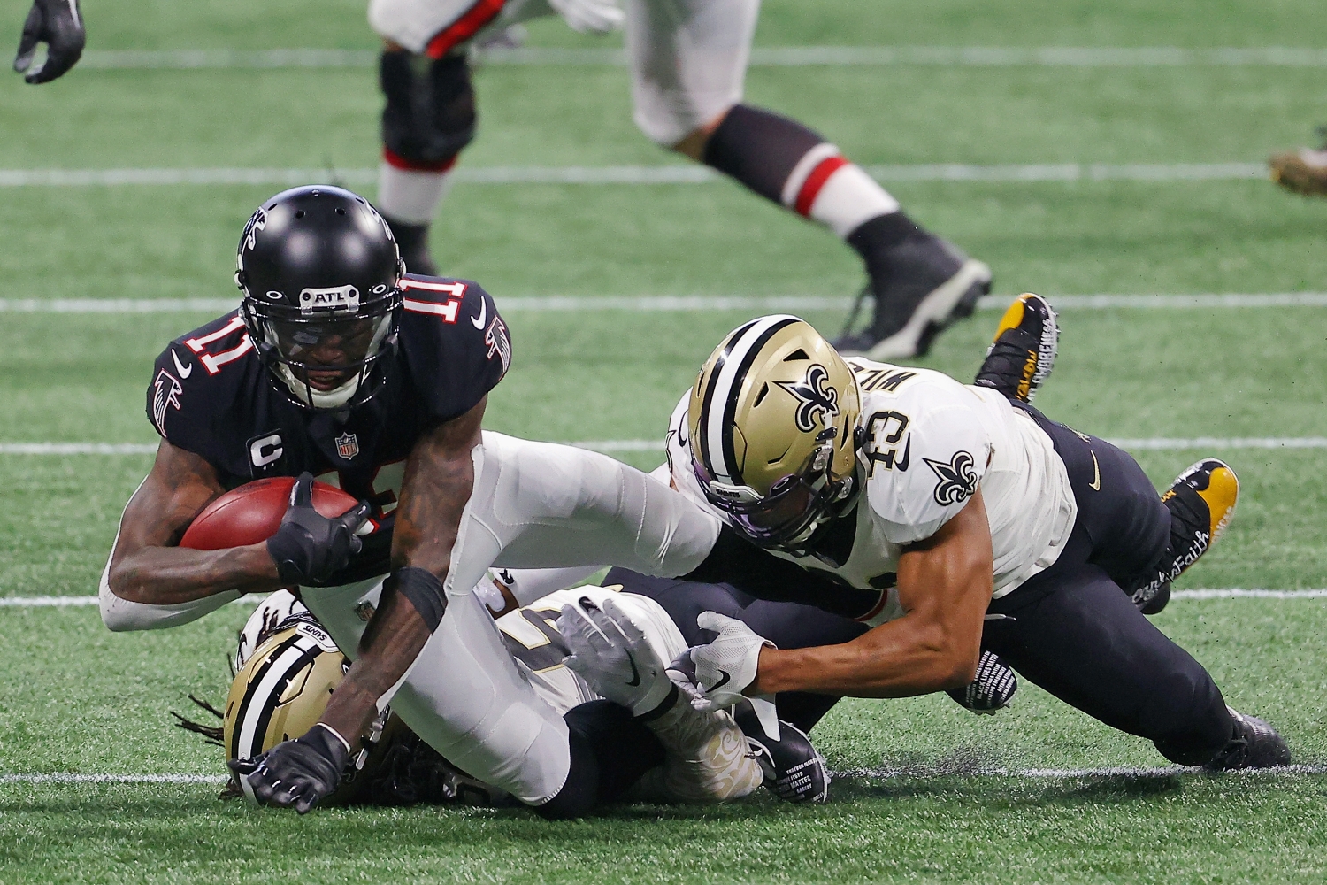 Atlanta Falcons wide receiver Julio Jones gets tackled during a game against the New Orleans Saints.