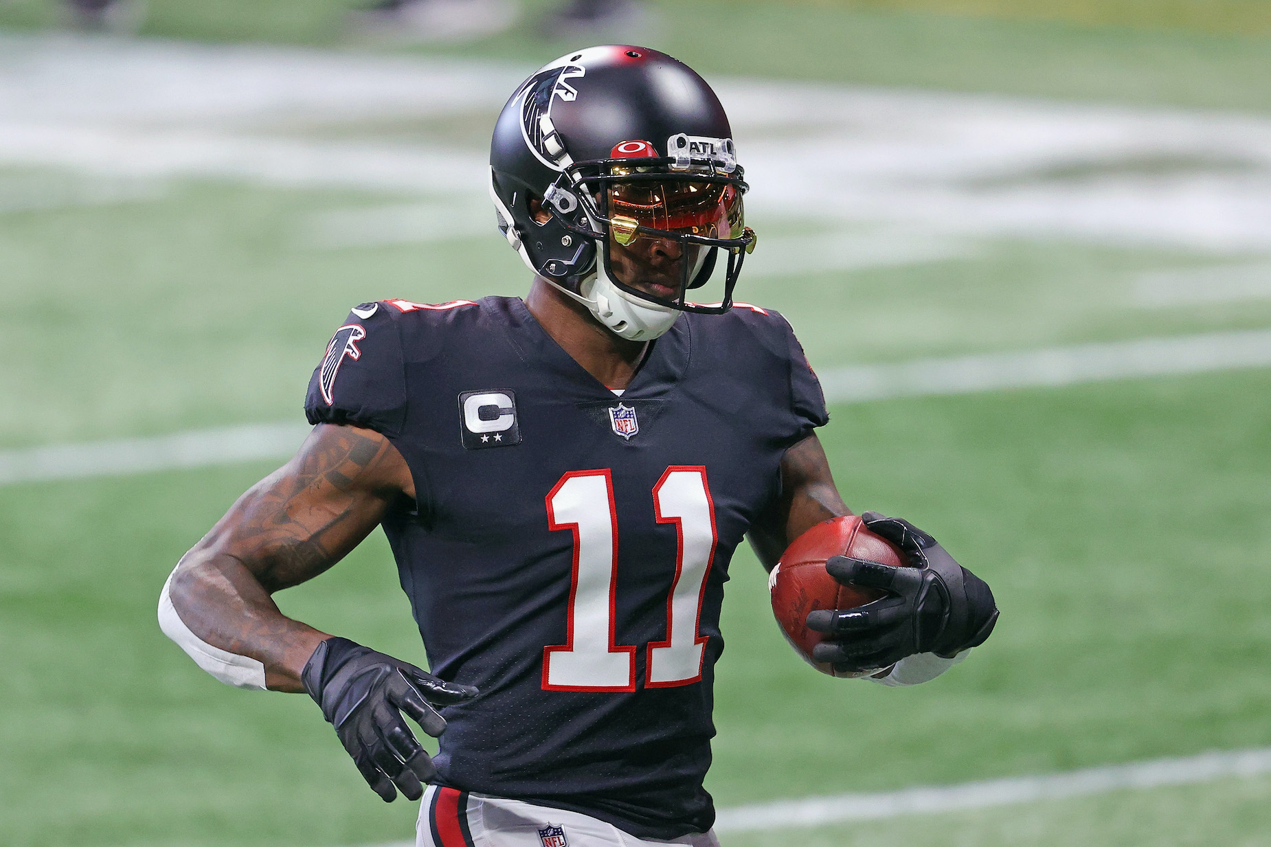 Atlanta Falcons receiver Julio Jones warms up ahead of an NFL game.