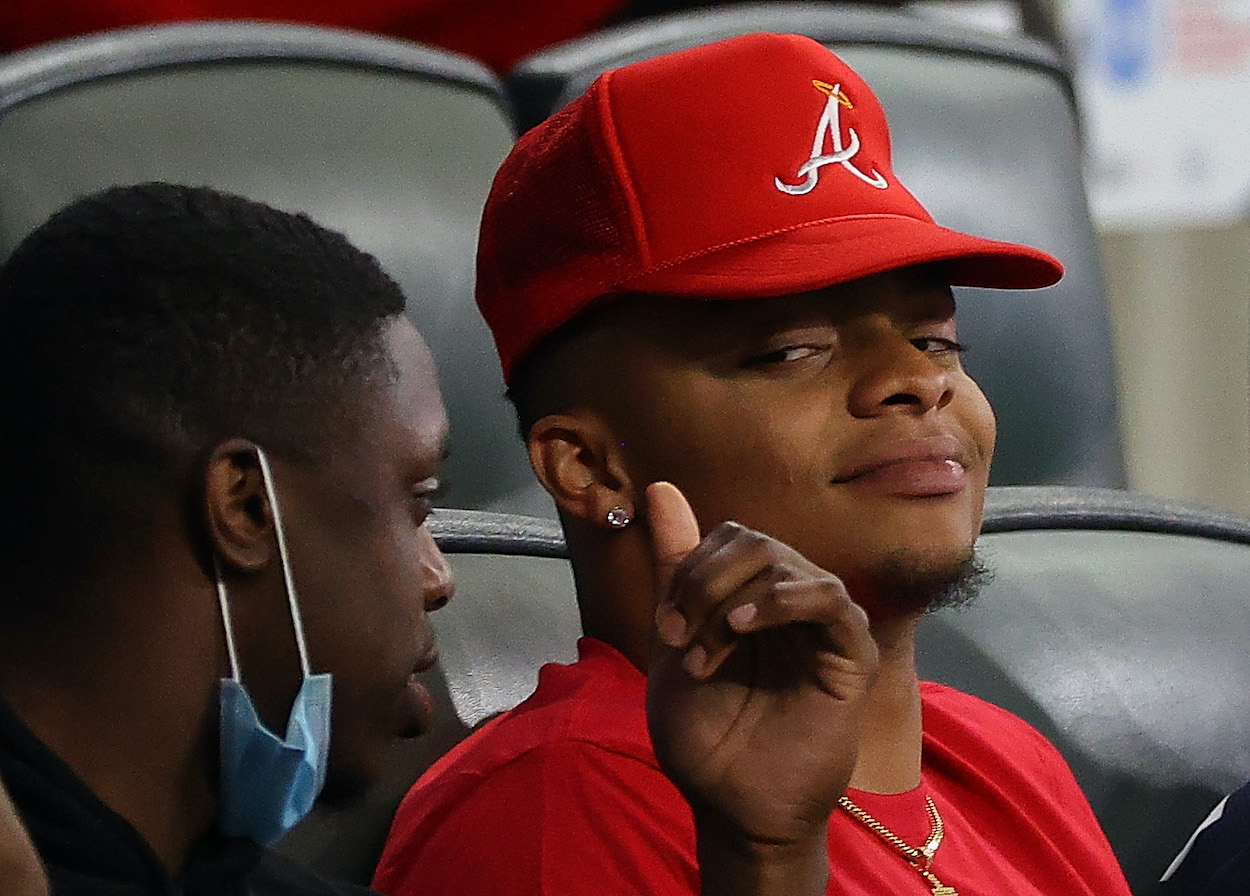 Chicago Bears quarterback Justin Fields watches the game between the Atlanta Braves and the Chicago Cubs at Truist Park on April 26, 2021 in Atlanta, Georgia.