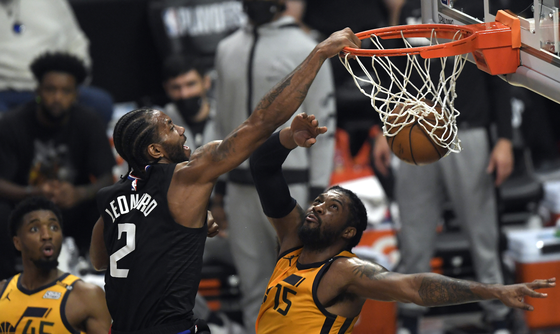 Kawhi Leonard throws down a dunk during a Clippers playoff game.