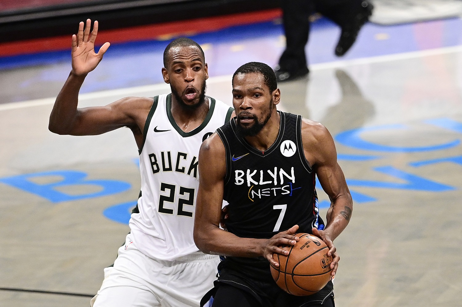 Kevin Durant of the Brooklyn Nets is defended by felloe Team USA Olympics participant Khris Middleton of the Milwaukee Bucks in Game 5 of the 2021 NBA Eastern Conference semifinals.