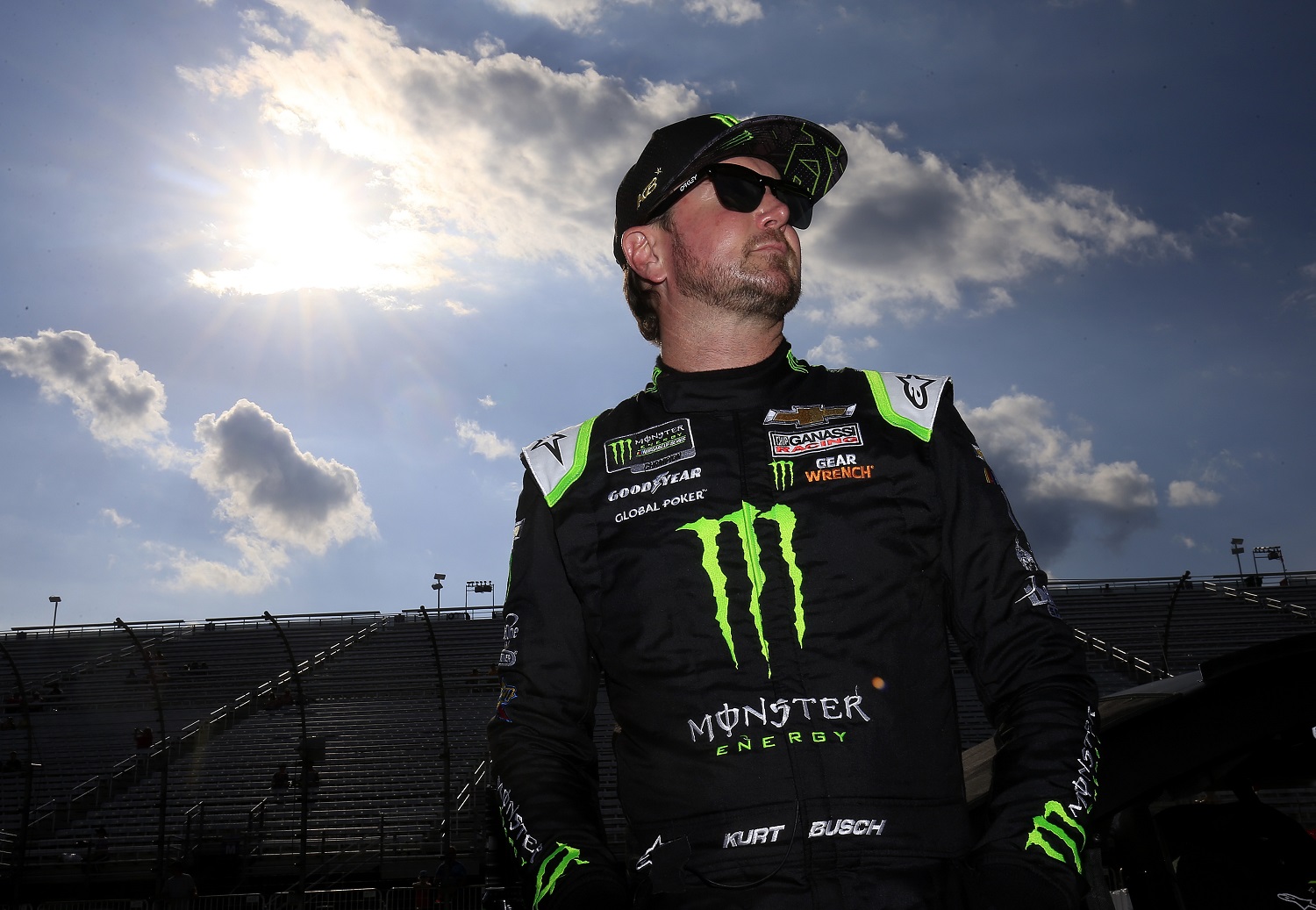 Kurt Busch, driver of the Monster Energy Chevrolet, stands by his car during qualifying for the Monster Energy NASCAR Cup Series Foxwoods Resort Casino 301 on July 19, 2019.