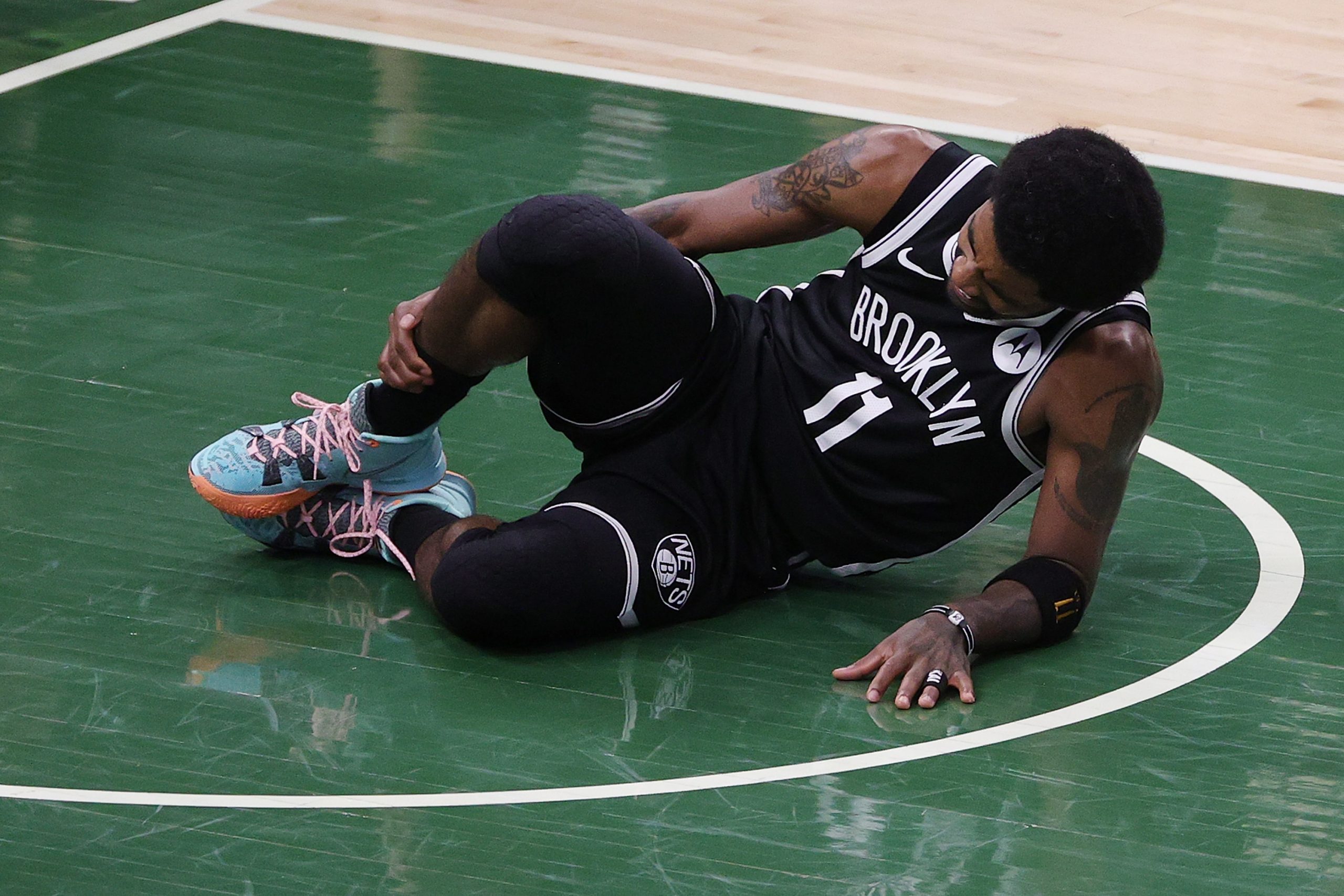 A former Boston Celtics player suggested Kyrie Irving's ankle injury suffered Sunday was karma.