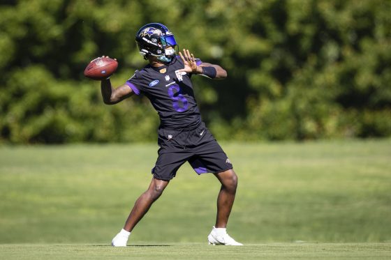 Quarterback Lamar Jackson throws a pass during Baltimore Ravens OTAs.
