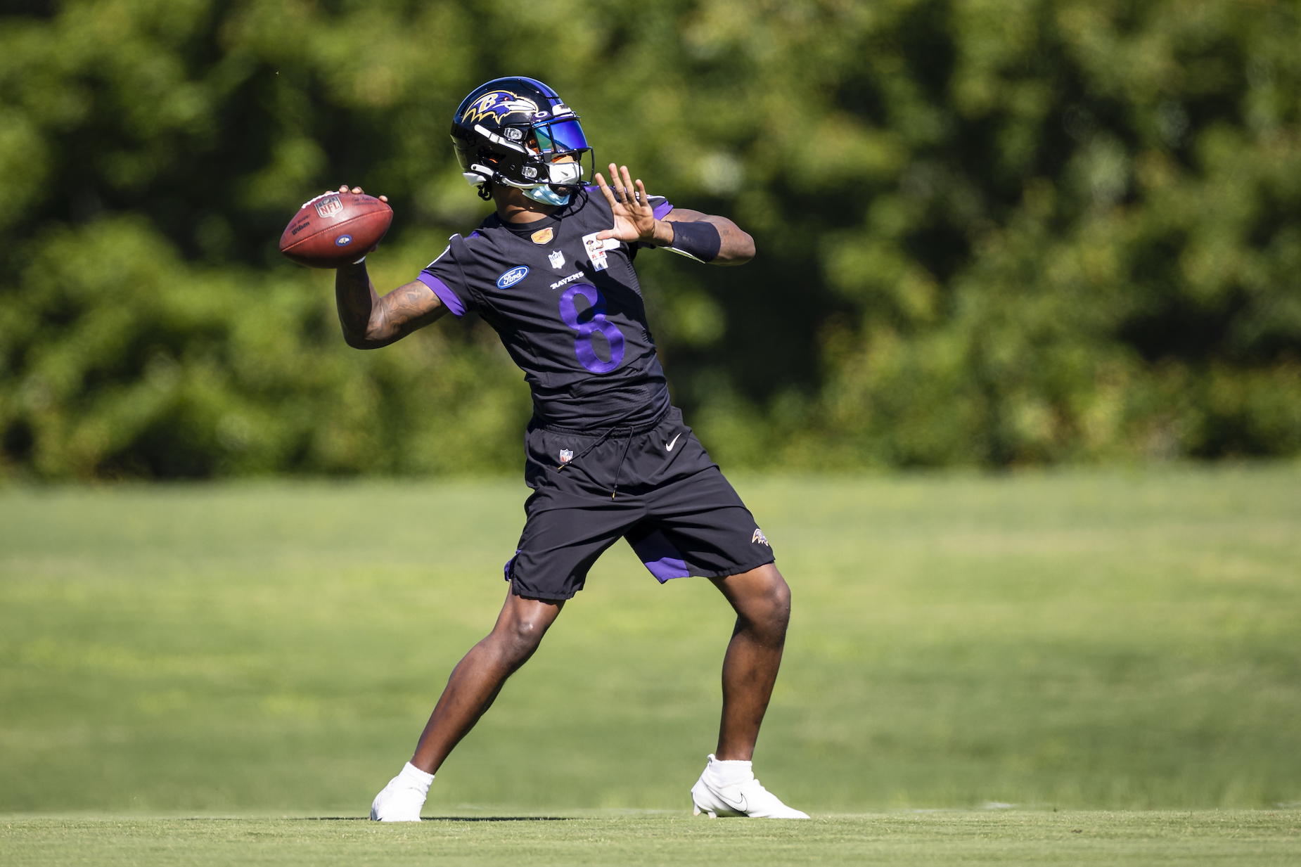 Quarterback Lamar Jackson throws a pass during Baltimore Ravens OTAs.