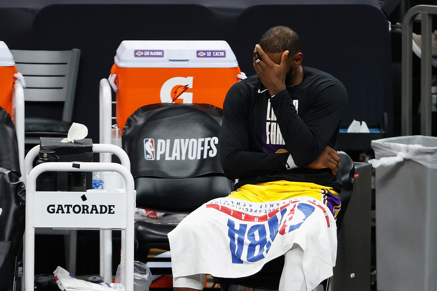 LeBron James of the Los Angeles Lakers reacts on the bench during Game 5 of the Western Conference first-round playoff series against the Phoenix Suns.
