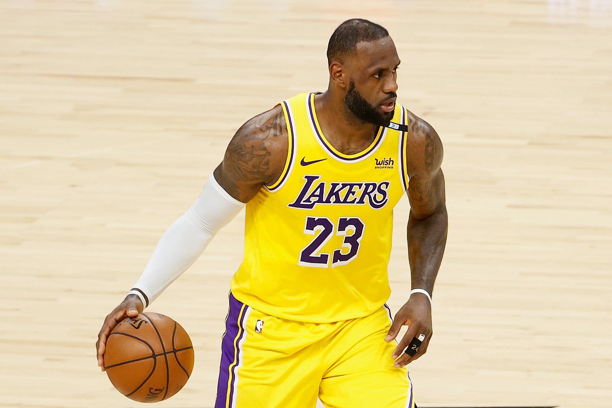 LeBron James handles the ball during Game 5 of the Lakers-Suns series in the opening round of the 2021 NBA playoffs