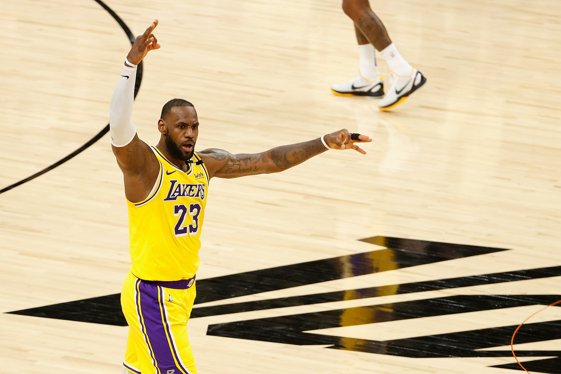 LA Lakers star. LeBron James celebrates a three-pointer during a NBA playoff game