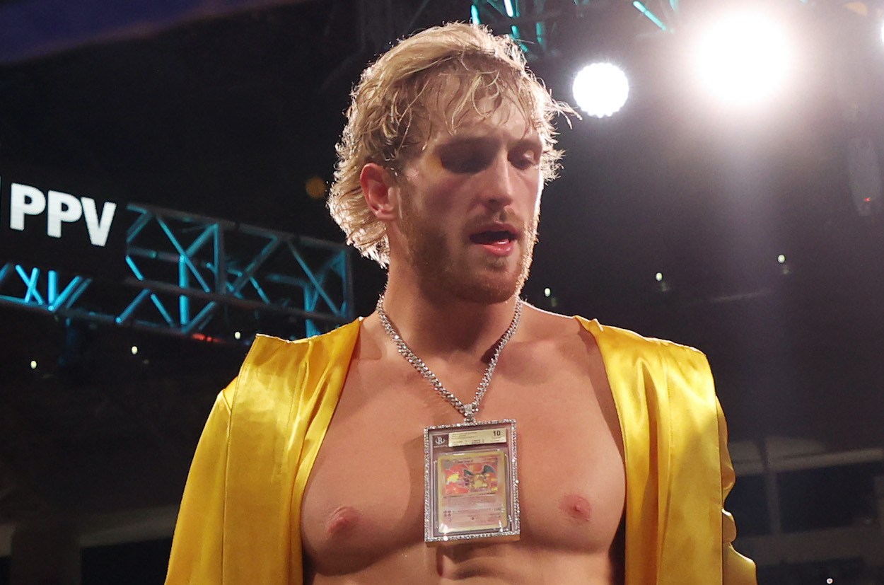 Logan Paul wears a Charizard Pokemon card chain as he enters the ring for his contracted exhibition boxing match against Floyd Mayweather at Hard Rock Stadium on June 06, 2021 in Miami Gardens, Florida.