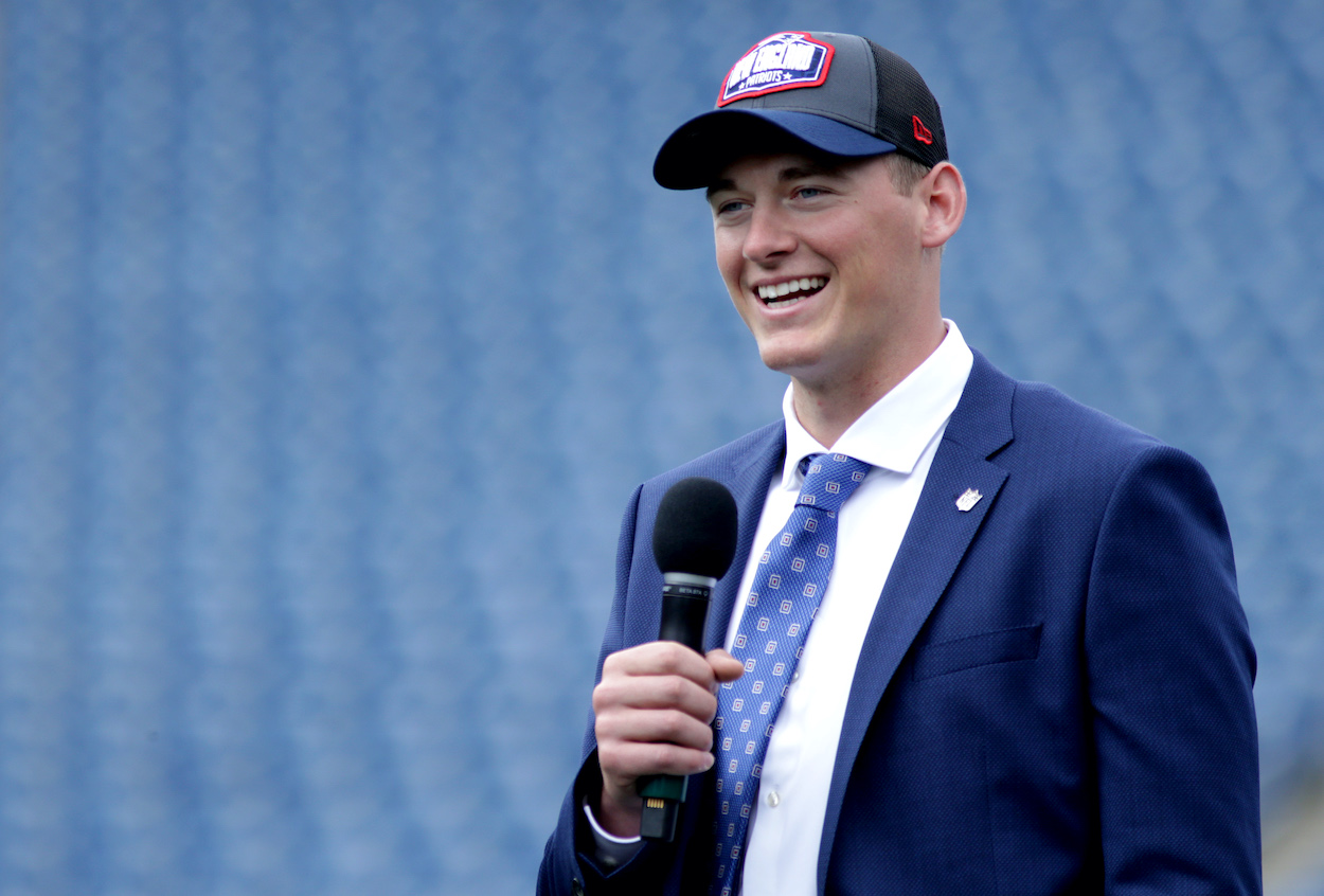The New England Patriots first-round draft pick Mac Jones talks with the media after he received his ceremonial #1 jersey in Foxborough, MA on April 30, 2021.