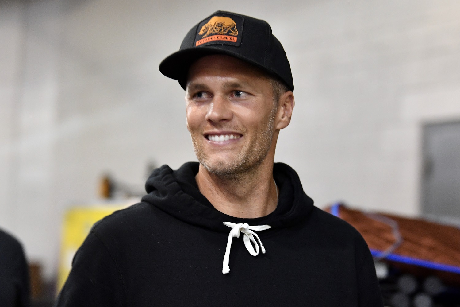 Tampa Bay Buccaneers quarterback Tom Brady arrives backstage during the UFC 261 event at VyStar Veterans Memorial Arena on April 24, 2021, in Jacksonville, Florida.