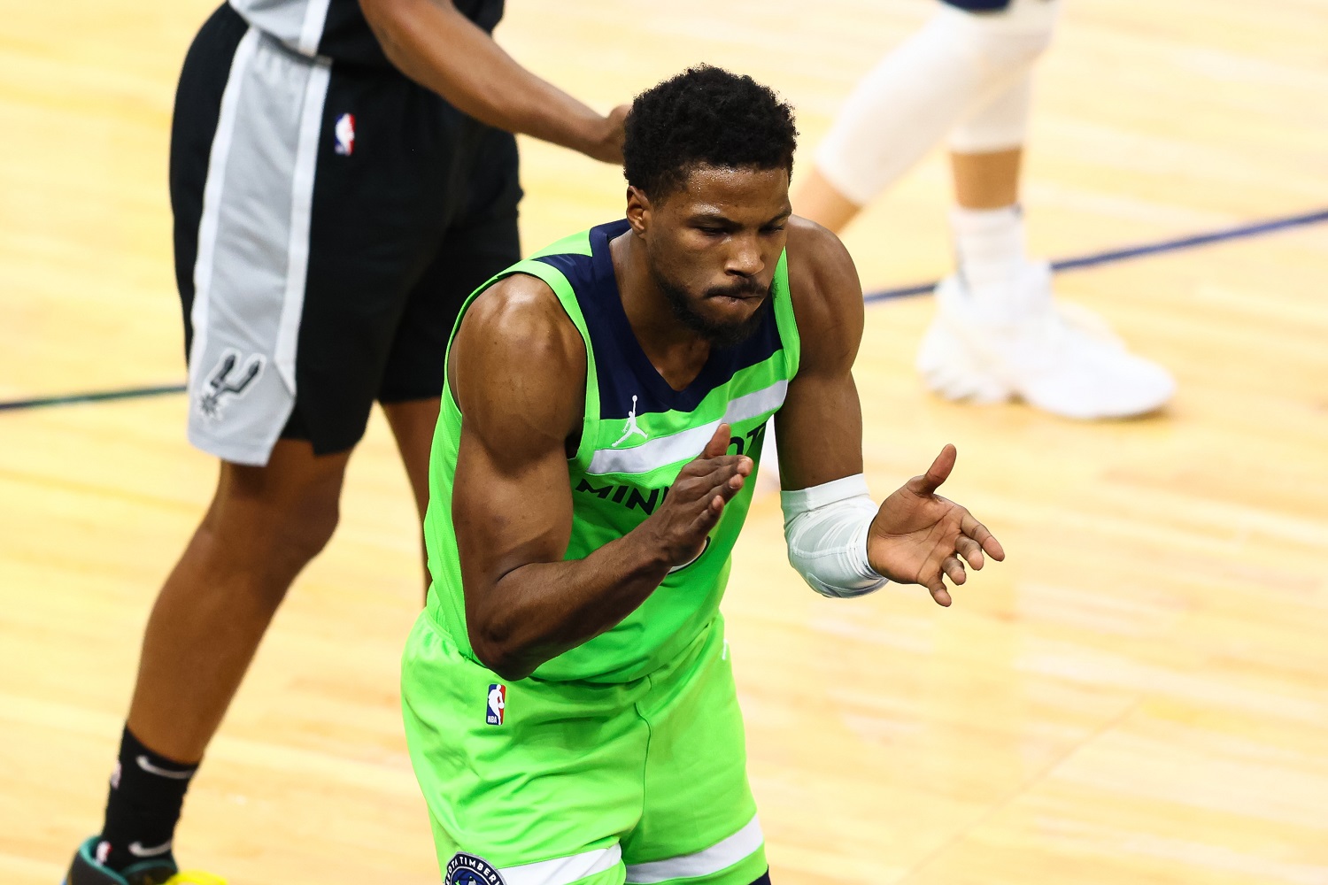 Malik Beasley of the Minnesota Timberwolves reacts after scoring during the fourth quarter against the San Antonio Spurs at Target Center on Jan. 9, 2021, in Minneapolis, Minnesota.