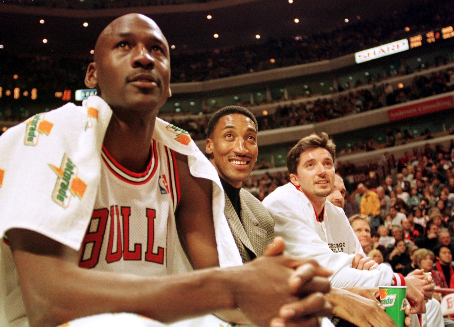 Chicago Bulls guard Michael Jordan watches his teammates play against the Milwaukee Bucks during a December 1997 NBA game.