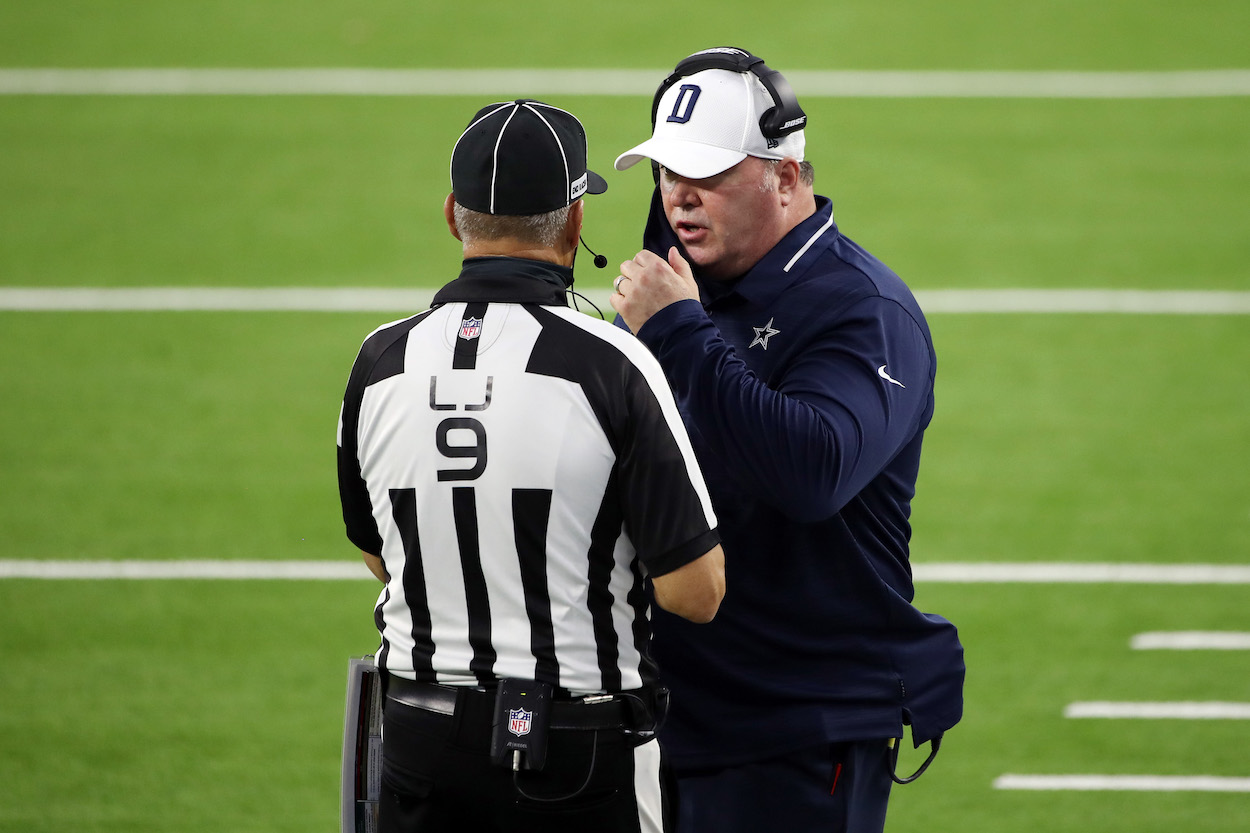 Dallas Cowboys Head Coach Mike McCarthy talks with official