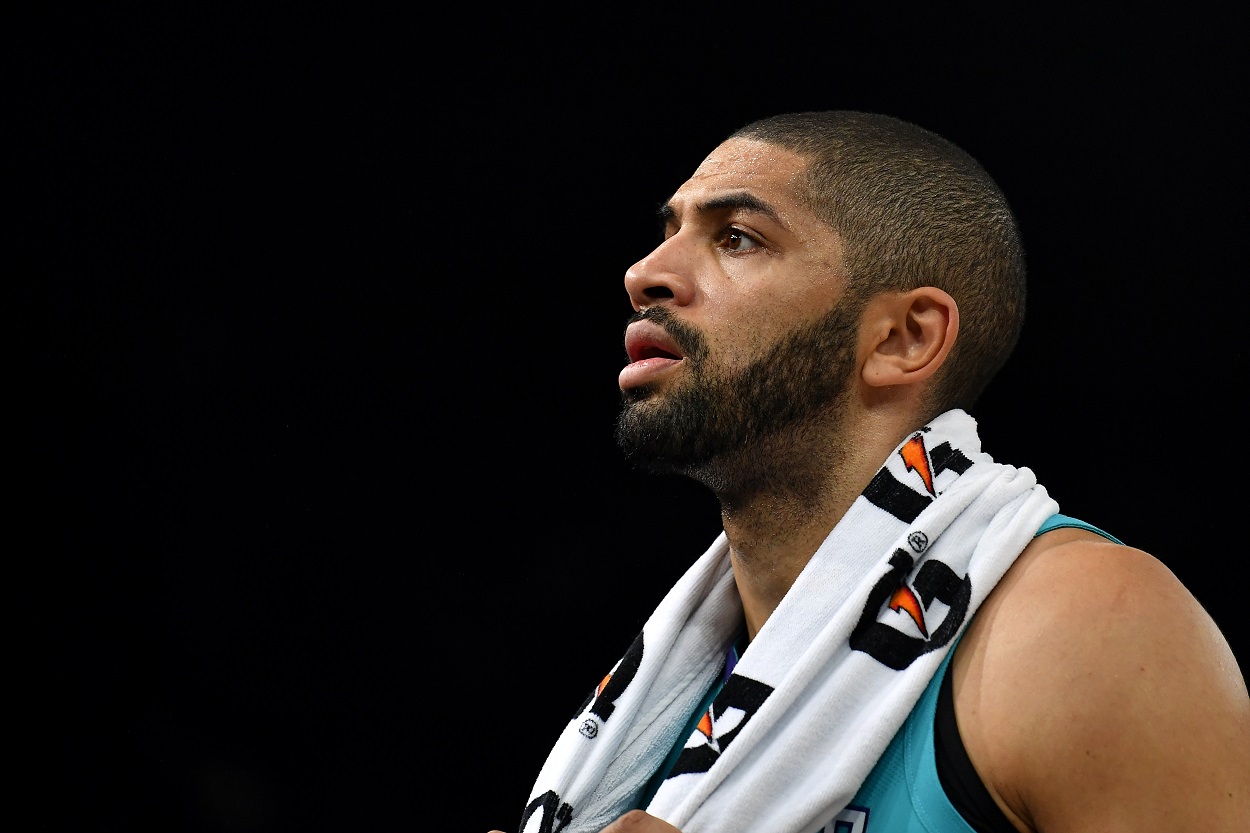 Nicolas Batum looks on during a Hornets-Bucks matchup in 2020 in Paris, France