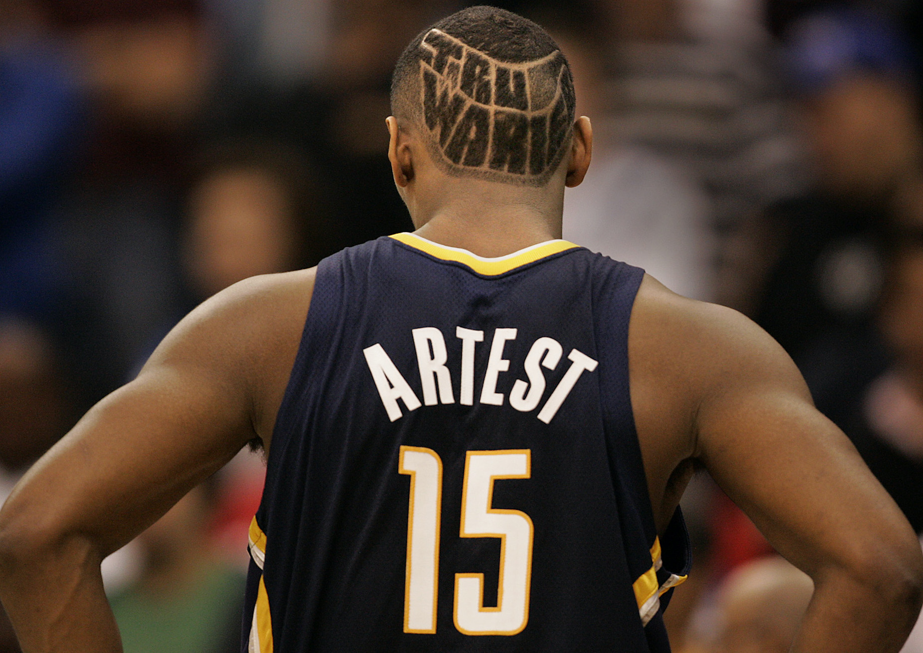 Indiana Pacer forward Ron Artest stands on the court.