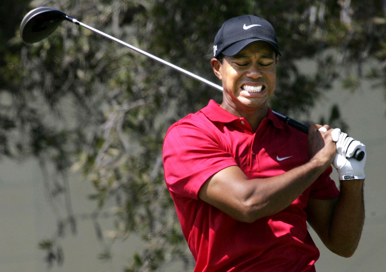 Tiger Woods grimaces after a tee shot on the final day of the 2008 U.S. Open at Torrey Pines