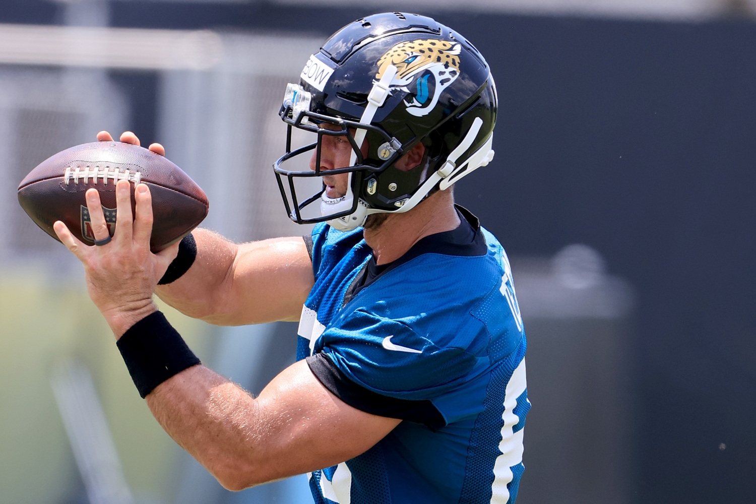 Jacksonville Jaguars tight end Tim Tebow catches a ball during practice.